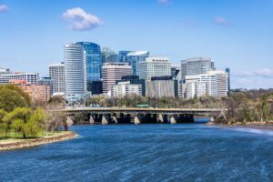 Stunning view of Rosslyn's skyline with the Arlington Memorial Bridge spanning the Potomac River.